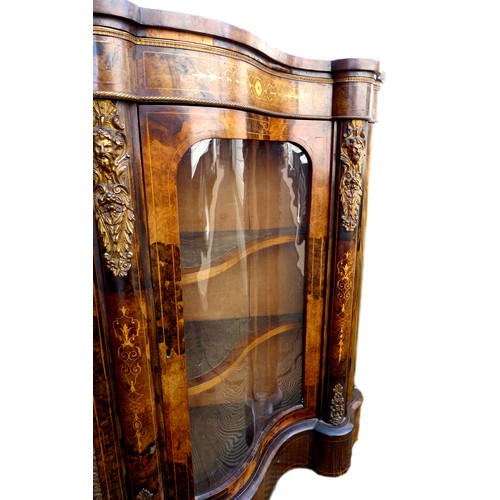 430 - A Victorian walnut veneered serpentine fronted credenza, marquetry inlaid and gilt metal mounted, ce... 