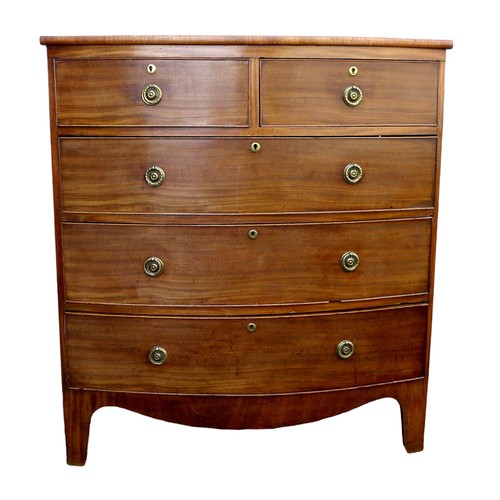 411 - A 19th century bowfront mahogany chest, with two over three drawers, oval brass ring handles, raised... 