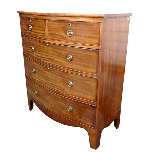 411 - A 19th century bowfront mahogany chest, with two over three drawers, oval brass ring handles, raised... 