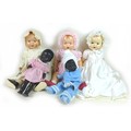 A collection of vintage dolls, all circa 1950s, comprising a Pedigree Head Turning Walker doll, simi... 