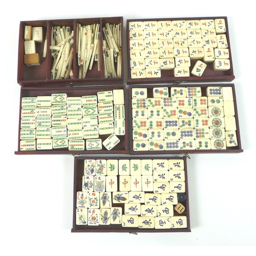 110 - An early 20th century Mahjong set, the case with slide front panel revealing five trays, filled with... 