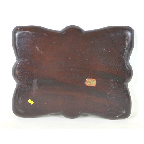 93 - A set of three graduated mahogany trays, circa 1900, shaped with carved edges, labels to verso, larg... 