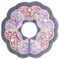 An early 20th century Chinese silk textile collar, of dodecagon form with floral design, 29cm diamet... 
