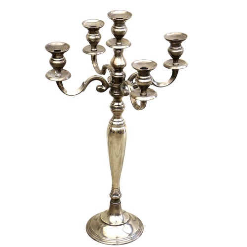 71 - A modern white metal floor standing candleabrum, four branch plus central nozzle, 44 by 78cm high.