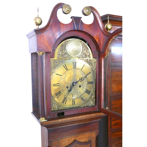 423 - A 18th century oak and mahogany long case clock, by Jonathan Overall of Ramsey, with broken pediment... 