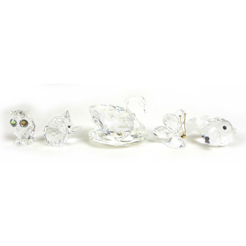 65 - A group of Swarovski crystal animal figurines, comprising an elephant, ladybird, a large puffer fish... 