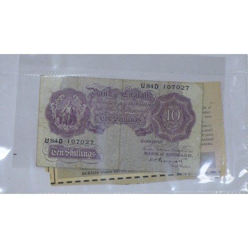 60 - A collection of British coins and banknotes, including over twenty-five £1s (including unc. Belfast,... 