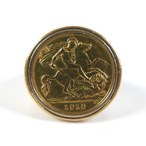 73 - A 9ct gold coin ring, fitted with a George V gold half sovereign, 1913, size X, 11.7g.