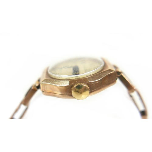 96 - A 9ct gold 'Record' lady's cocktail wristwatch, with Arabic dial, a 9ct gold octagonal case and gold... 