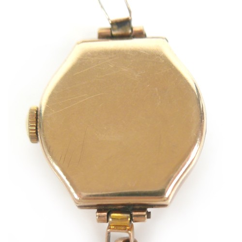 96 - A 9ct gold 'Record' lady's cocktail wristwatch, with Arabic dial, a 9ct gold octagonal case and gold... 