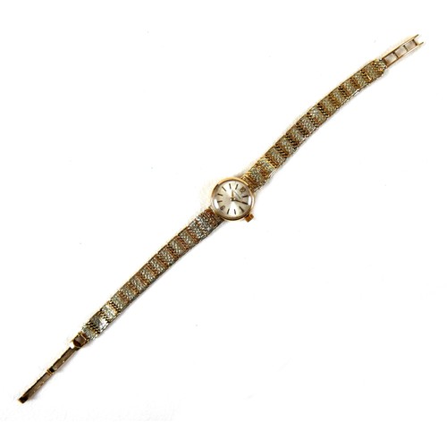 97 - A Certina 9ct gold lady's wristwatch, circa 1970s, with circular silvered dial, gold numerals, gold ... 