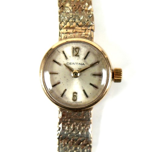 97 - A Certina 9ct gold lady's wristwatch, circa 1970s, with circular silvered dial, gold numerals, gold ... 