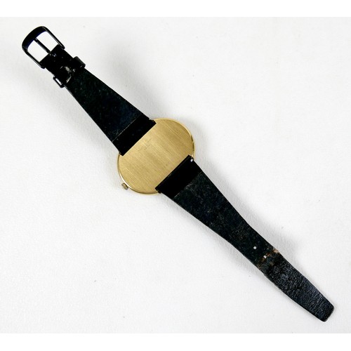 93 - A Maurice Guerdat gold plated lady's dress watch, minimalist oval black dial, gold hands, quartz mov... 