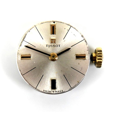 101 - A Tissot 9ct gold lady's wristwatch, circa 1966, with circular silvered dial, gold and black baton c... 