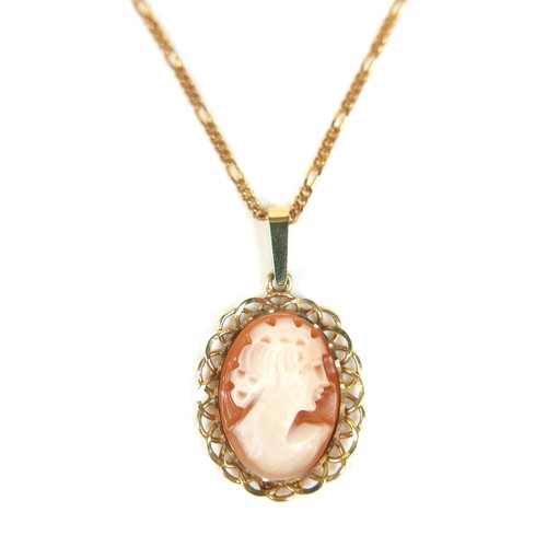 153 - A 9ct gold necklace with 9ct gold cameo pendant, necklace 49cm long, cameo 2 by 2.5cm, 6g gross, tog... 