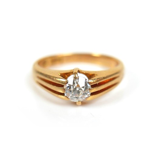 202 - An 18ct gold diamond solitaire ring, the round cut diamond approximately 4mm diameter, size L/M, 4.2... 