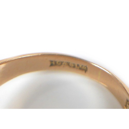 176 - An 18ct gold signet ring, inscribed 'GHC', size M/N, 8.5g.