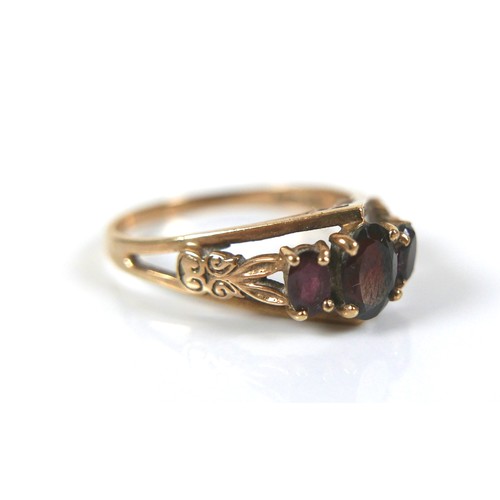 178 - Two 9ct gold dress rings, comprising an amethyst ring with open work crown setting, round cut stone,... 