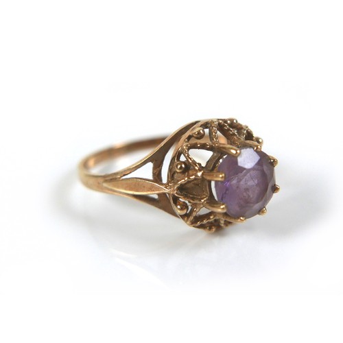 178 - Two 9ct gold dress rings, comprising an amethyst ring with open work crown setting, round cut stone,... 