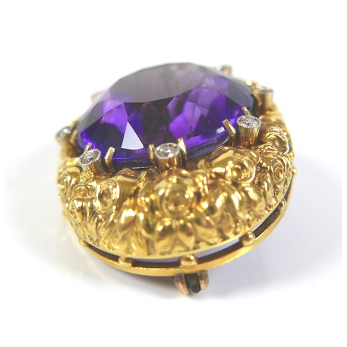 203 - A Victorian amethyst, diamond, and 14ct yellow gold brooch, of oval form set centrally with a circul... 