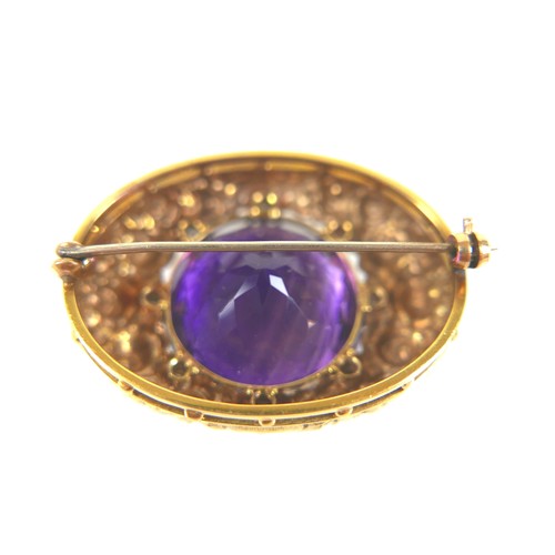 203 - A Victorian amethyst, diamond, and 14ct yellow gold brooch, of oval form set centrally with a circul... 