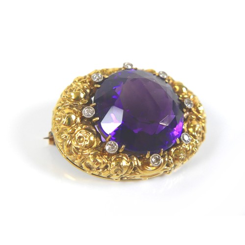 203 - A Victorian amethyst, diamond, and 14ct yellow gold brooch, of oval form set centrally with a circul... 