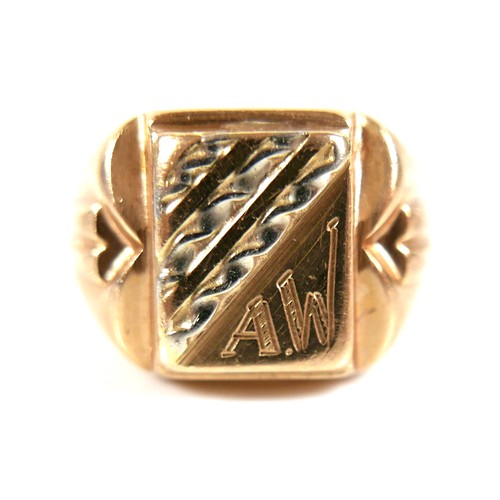 175 - An 18ct gold fancy signet ring, with initials 'AW' engraved, size Q/R, 8.2g.