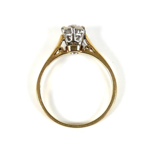 196 - An 18ct yellow gold and diamond solitaire ring, the round brilliant cut stone, 5.5 by 3.5mm, approxi... 