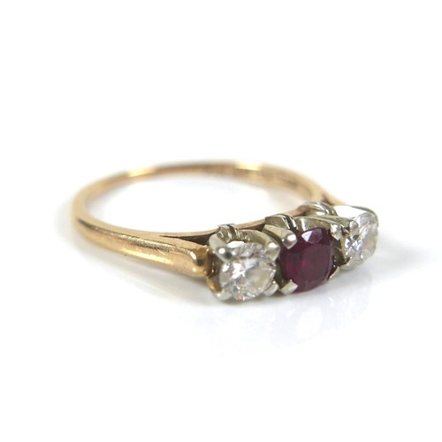 187 - A group of three gold rings, comprising a 14ct and 18ct gold diamond and ruby three stone ring, each... 