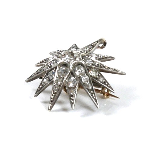 200 - A Victorian diamond set starburst brooch, the central diamond of approximately 0.22ct, 3.2mm, surrou... 