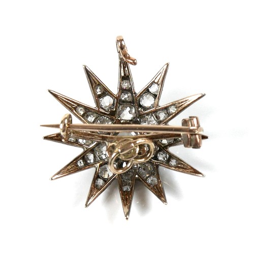 200 - A Victorian diamond set starburst brooch, the central diamond of approximately 0.22ct, 3.2mm, surrou... 