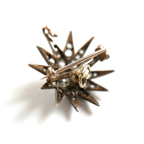 200 - A Victorian diamond set starburst brooch, the central diamond of approximately 0.22ct, 3.2mm, surrou... 