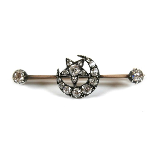 194 - A Victorian yellow gold and silver mounted diamond bar brooch, formed as a crescent moon and star, t... 