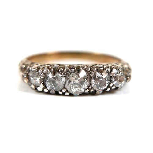 190 - An 18ct yellow gold five stone diamond ring, the old cut stones of graduated size, largest 3.5mm, si... 