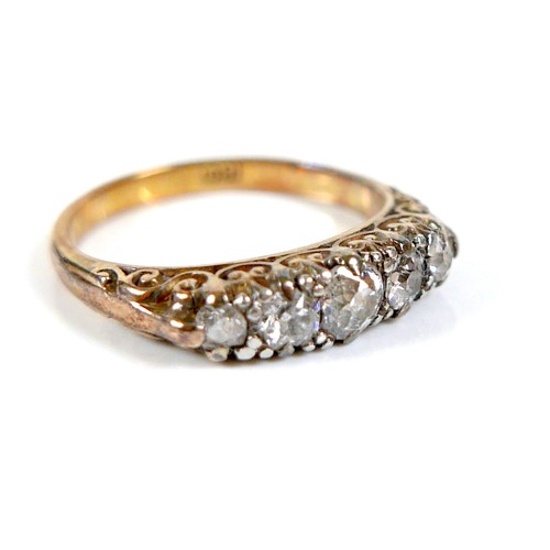 190 - An 18ct yellow gold five stone diamond ring, the old cut stones of graduated size, largest 3.5mm, si... 