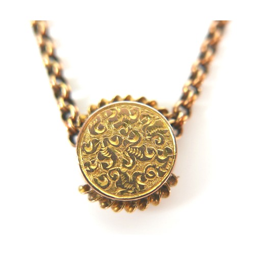 171 - A 9ct gold chain with yellow metal disc circular form pendant, necklace 42cm long, 10.9g overall.