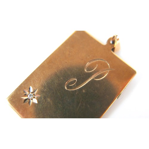 169 - A 9ct gold rectangular pendant with single diamond, engraved with initial 'P', 10.5g, 2.5 by 3.8cm o... 