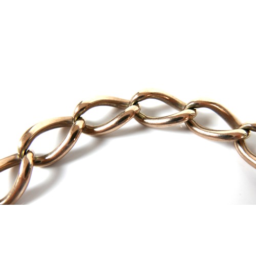 193 - A 9ct yellow gold curb link bracelet, with heart shaped padlock clasp and safety chain, 0.9 by 16cm ... 