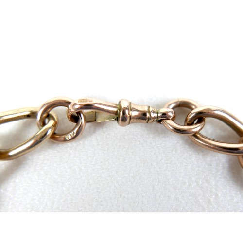 199 - A 9ct rose and yellow gold curb link bracelet, hallmarked to each link, 0.9 by 22cm long, 31.5g.