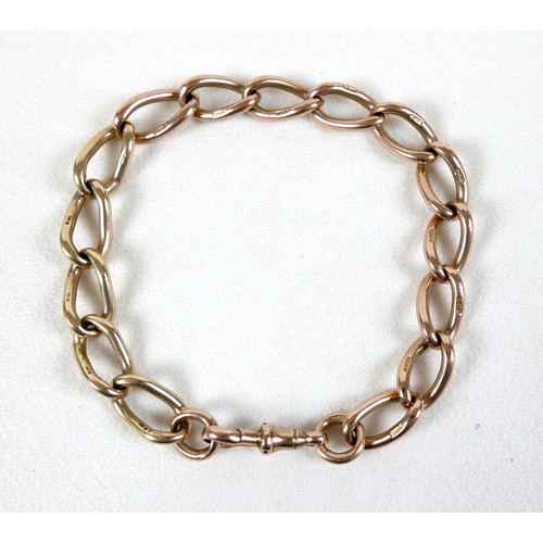 199 - A 9ct rose and yellow gold curb link bracelet, hallmarked to each link, 0.9 by 22cm long, 31.5g.