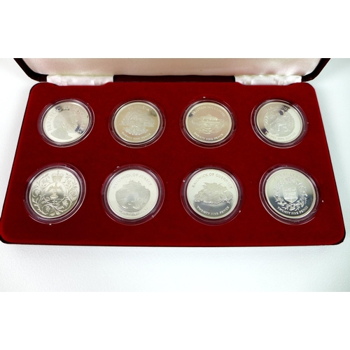 60A - A Queen Elizabeth II Silver Jubilee 1977 silver proof eight crown sized coin collection, in fitted S... 