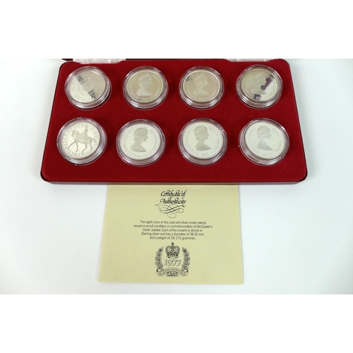 60A - A Queen Elizabeth II Silver Jubilee 1977 silver proof eight crown sized coin collection, in fitted S... 