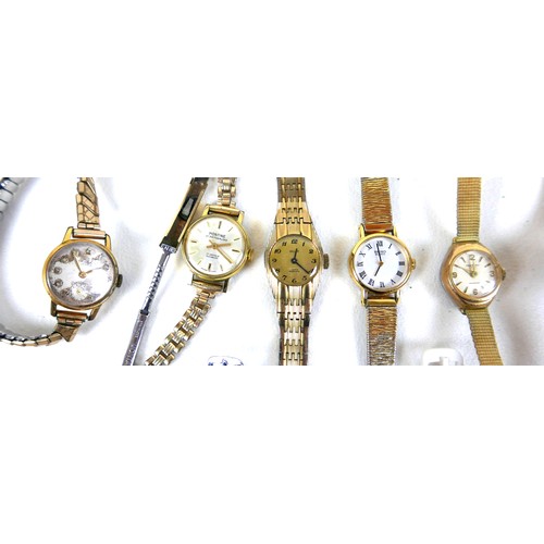 81 - A collection of lady's and gentleman's gold plated and steel wristwatches and cocktail watches, incl... 