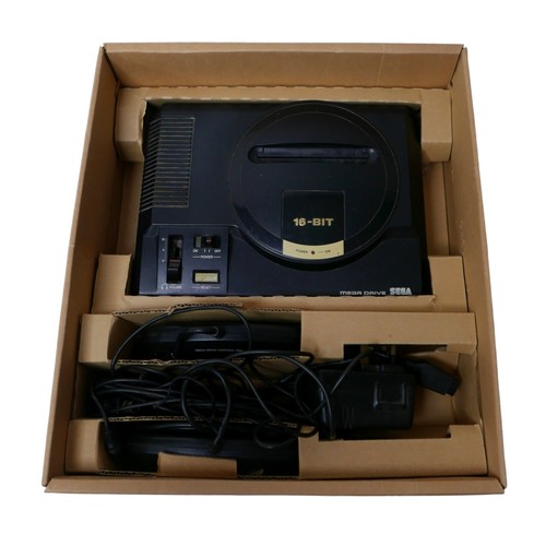 22 - A 1990s Sega Megadrive Sonic the Hedgehog edition console pack, with Sonic game, two controllers and... 