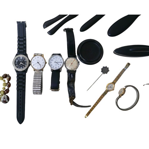 35 - A collection of costume jewellery, including watches, stick pins, necklaces, together with a ebony d... 