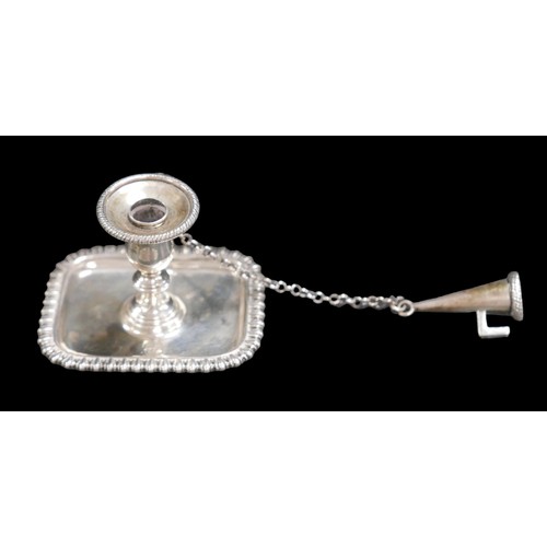 61 - A George III small silver chamber stick, with shell mount to handle, engraved monogram to its base, ... 