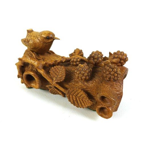 72 - A collection of carved oak ornaments, comprising a Wren Craftsman Sherwood oak carved wren and butte... 