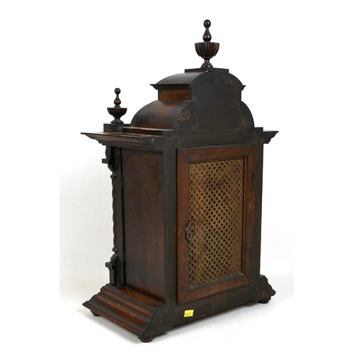 120 - An Edwardian mahogany mantel clock, architectural case with finials, 33 by 19 by 53cm, chime on coil... 