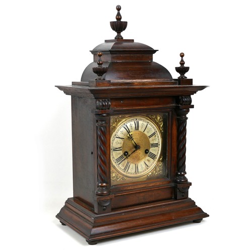 120 - An Edwardian mahogany mantel clock, architectural case with finials, 33 by 19 by 53cm, chime on coil... 