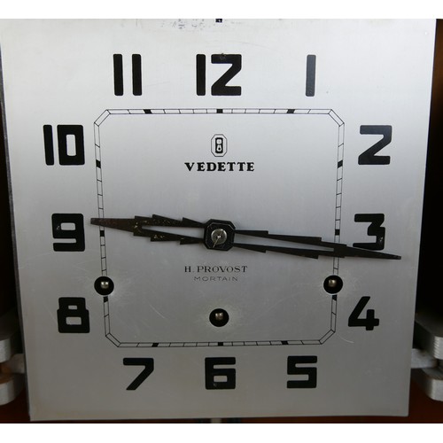 122 - A Vedette oak Art Deco wall clock, silvered dial, retailed by 'H. Provost, Mortain', with pendulum, ... 